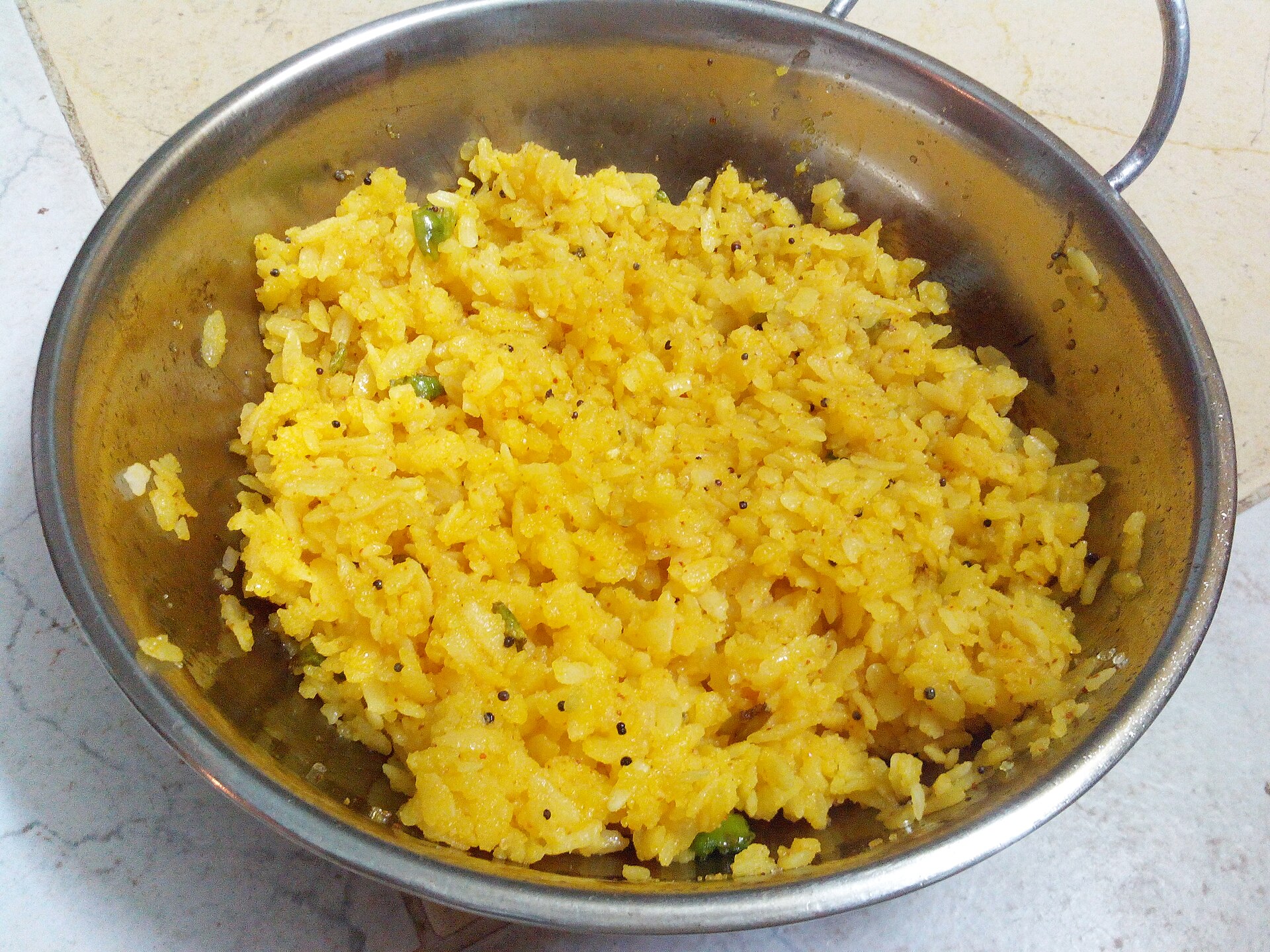 Photo de la recette « Pohe (riz aplati épicé) »