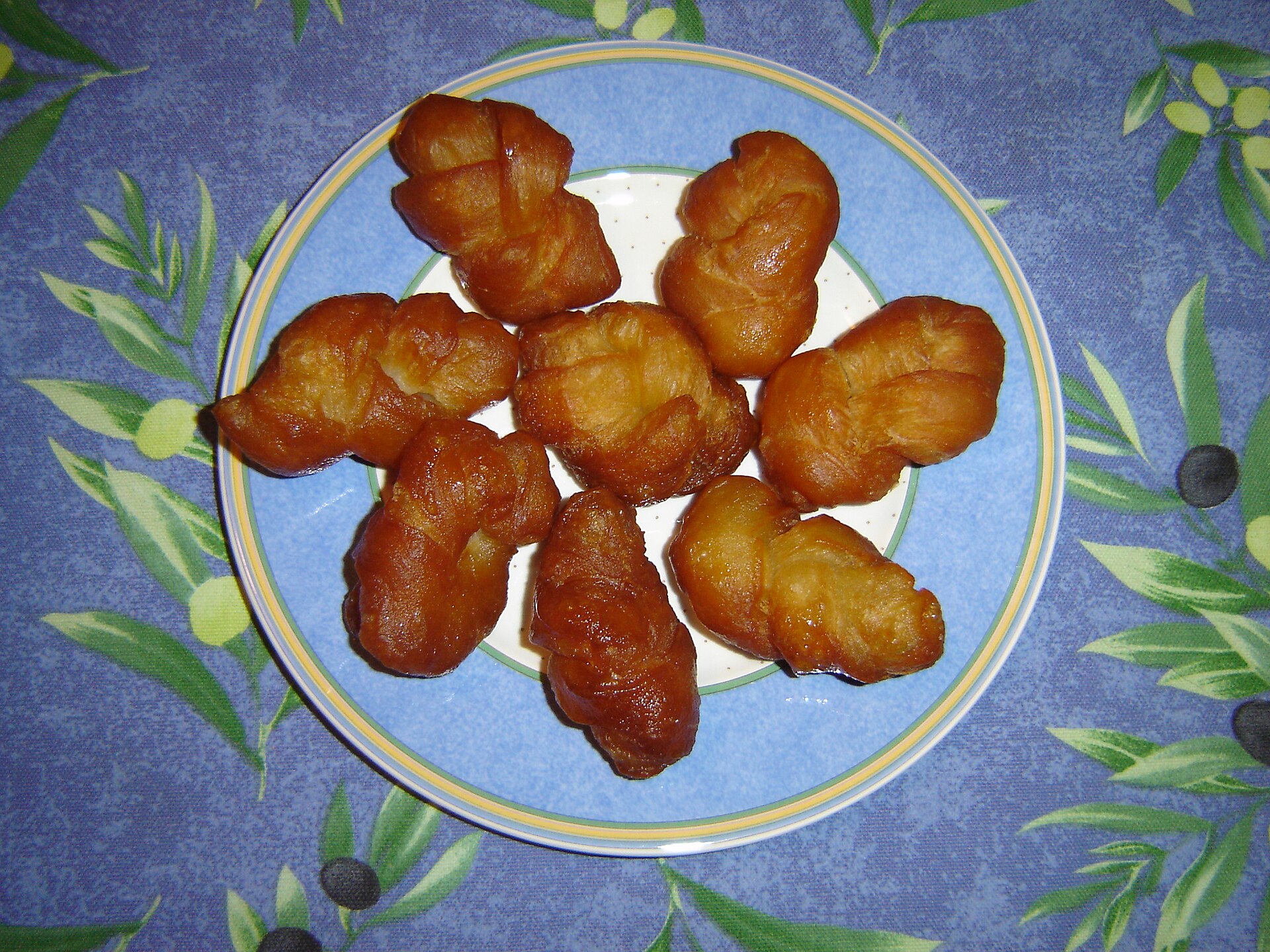 Photo de la recette « Koeksisters (pâtisseries tressées frites au sirop) »